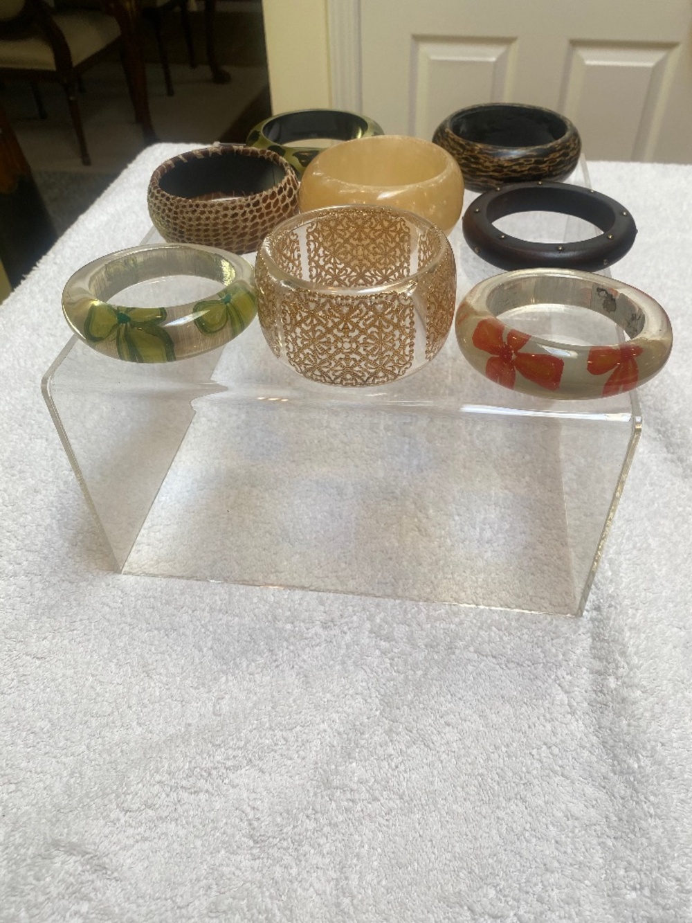 8 Bangle Bracelets.